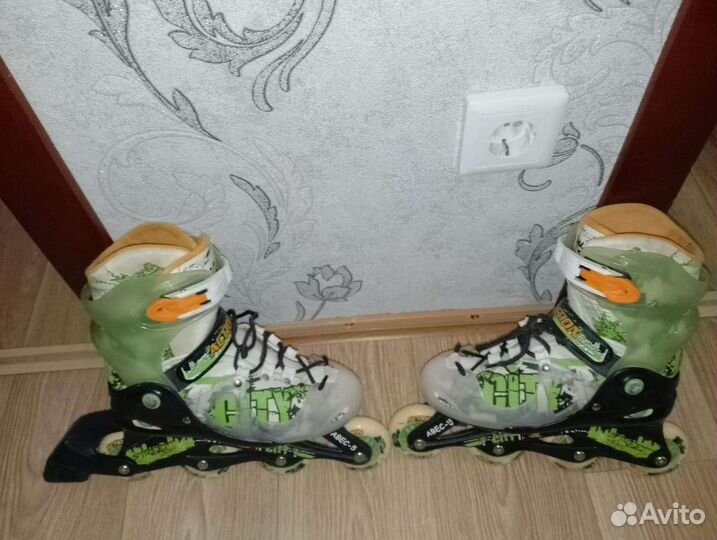 Роликовые коньки