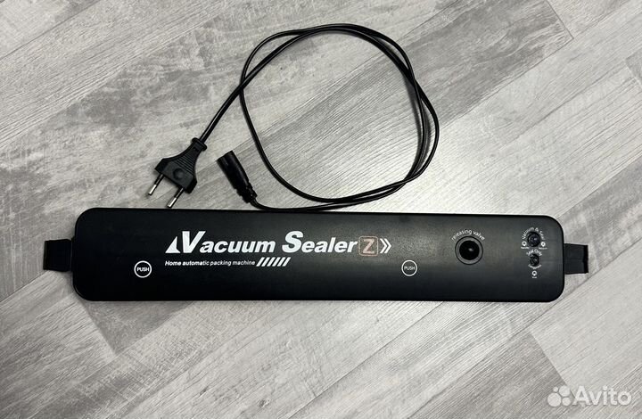 Вакуумный упаковщик
