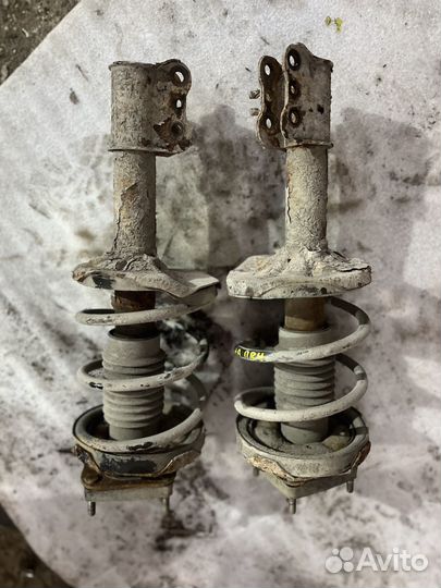 Стойка передняя Mazda Capella GF