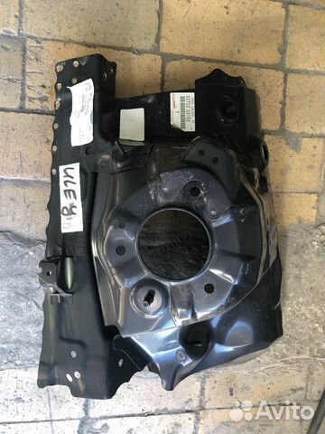 Брызговик крыла левый Toyota Camry-70