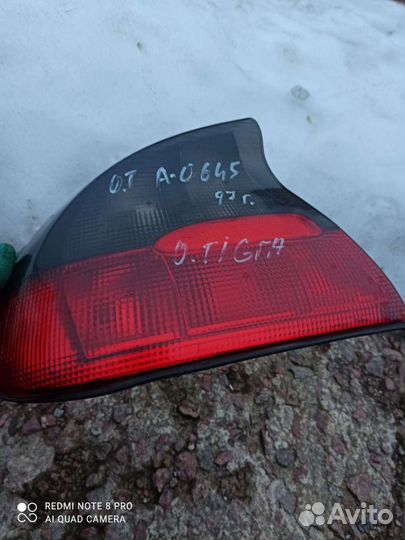 Opel Tigra A фонарь левый оригинал