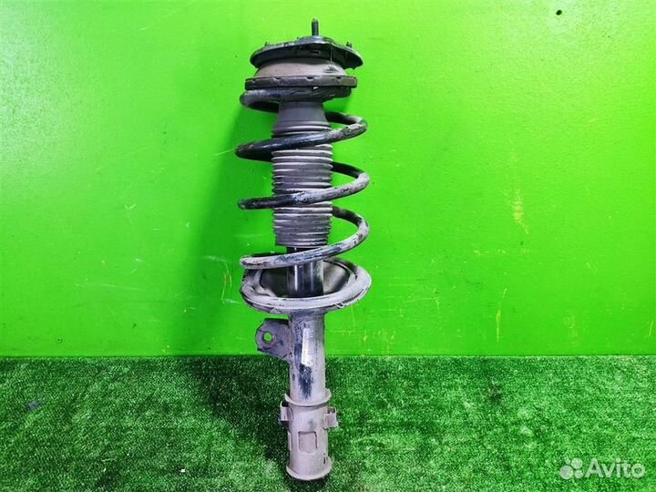 Стойка амортизатора передняя левая KIA RIO 2 (JB)