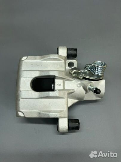 Суппорт тормозной задний левый Ford Focus 2