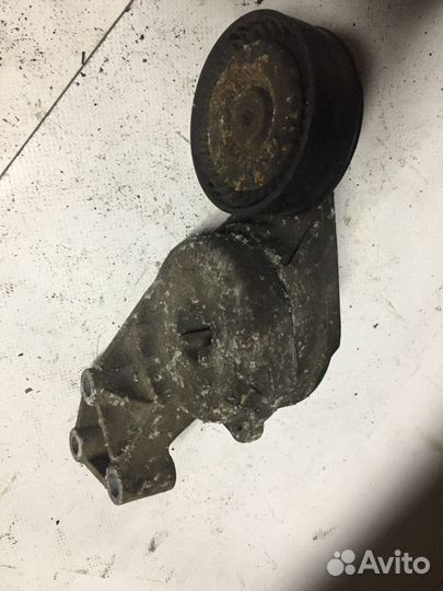 06A903315F Натяжитель ремня VAG