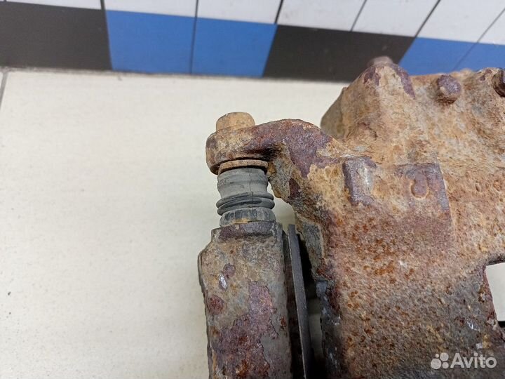 Суппорт передний левый Juke (F15) 2011