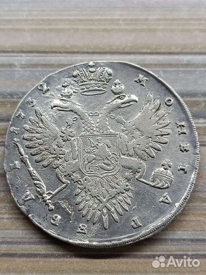 Монета рубль