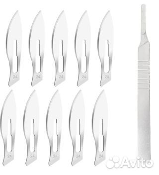 Скальпель со сменными лезвиями. новый