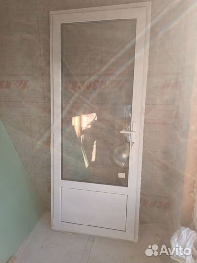 Балконная пластиковая дверь