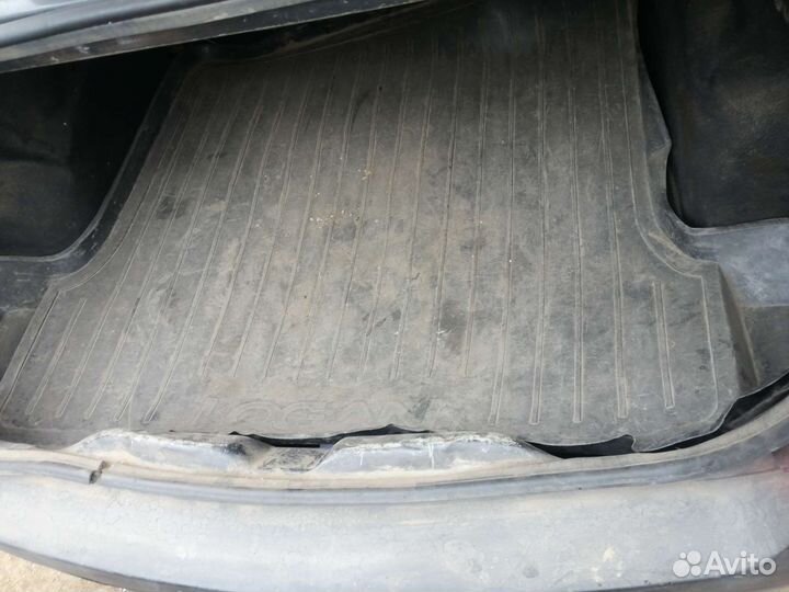 Коврик и ковролин багажника logan