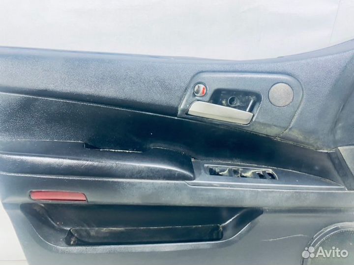 Обшивка двери передняя левая Ssang Yong Kyron