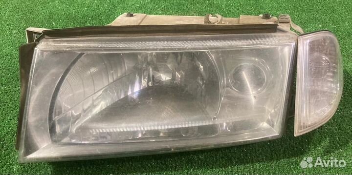 Фара левая Skoda Octavia A4