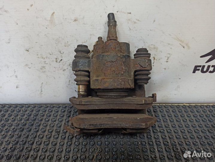 Суппорт тормозной задний левый Mercedes-Benz Ml320