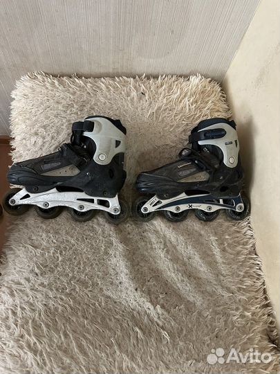 Роликовые коньки