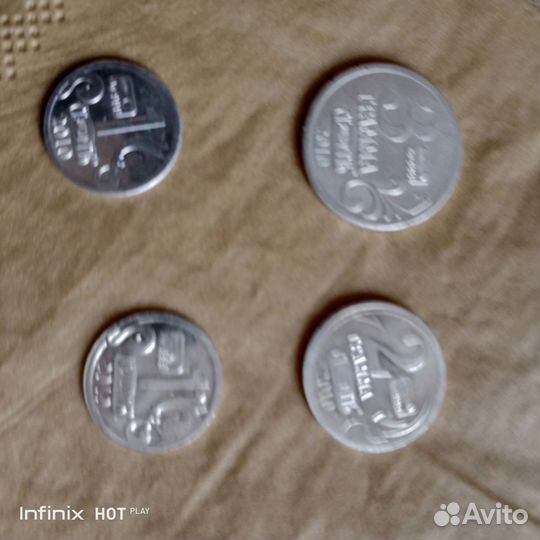 Четыре серебряных водочных жетона