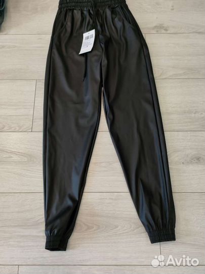 Кожаные штаны женские