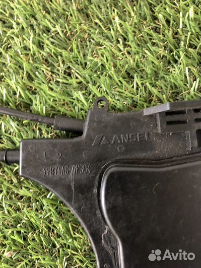 Замок двери левый Mitsubishi Outlander XL