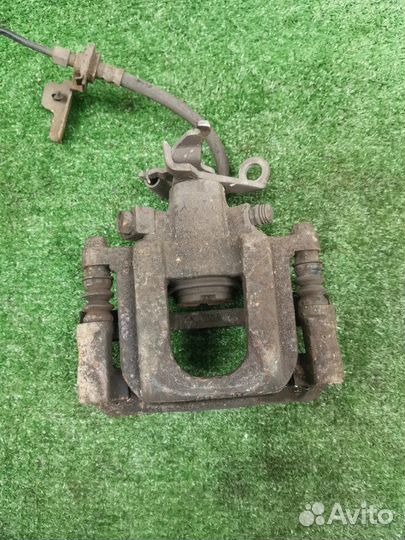 Суппорт тормозной задний правый Dodge Journey 2.4