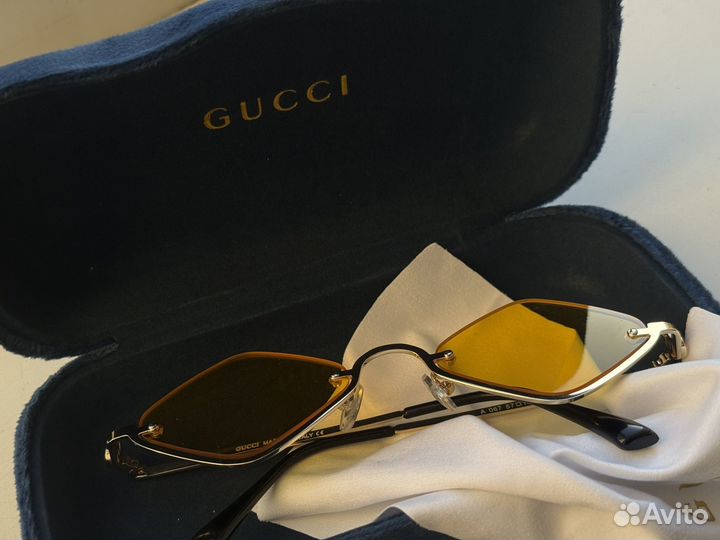Солнцезащитные очки Gucci