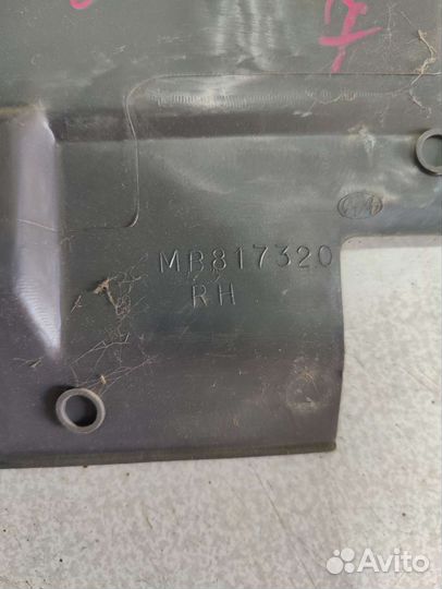 Обшивка багажника Mitsubishi Lancer 7