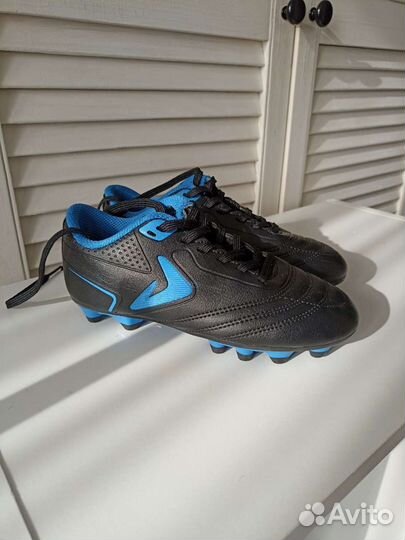 Бутсы и щитки Demix