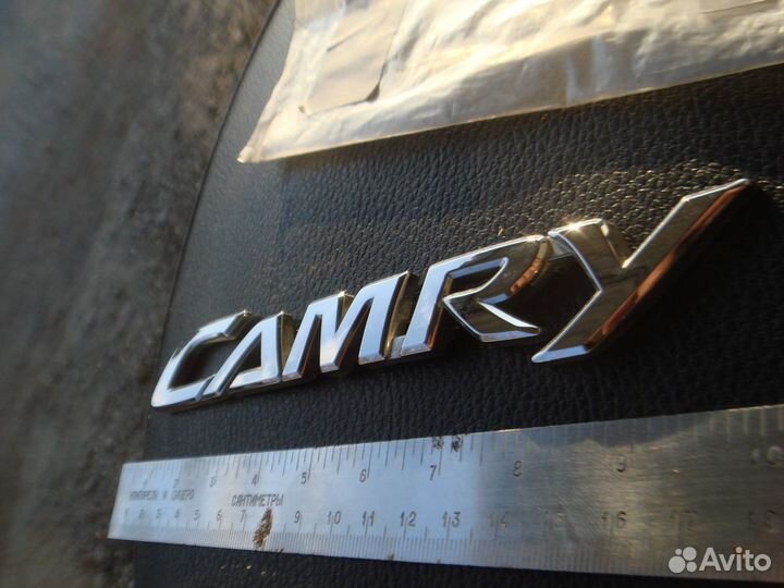 Тойота Эмблема задняя Camry 50 2011-18