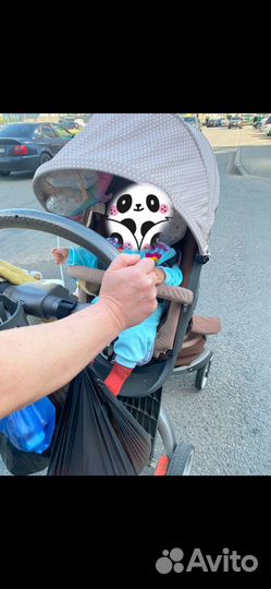 Коляска stokke