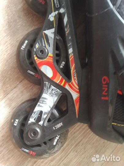 Роликовые коньки