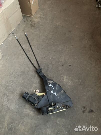 Замок двери задний левый Geely mk