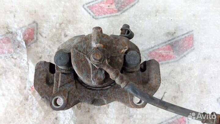 Суппорт тормозной передний правый Опель Астра Н