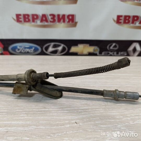 Трос стояночного тормоза левый Honda Domani 1999