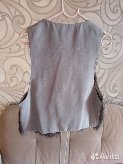 Жилетка меховая женская