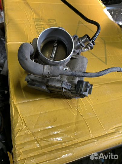 Заслонка дроссельная Chevrolet Aveo T250 V1,4