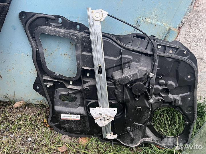 Обшивка двери mazda 3 вк