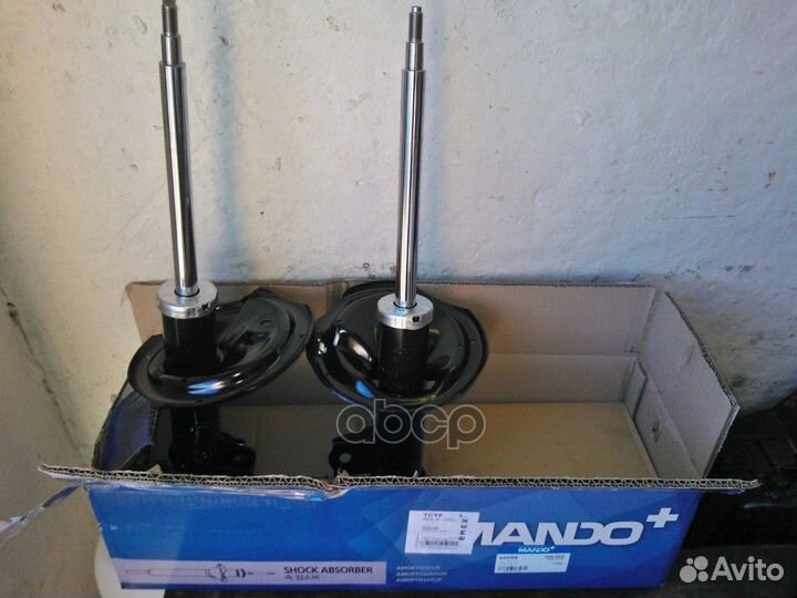 Амортизатор передний левый A00109 Mando