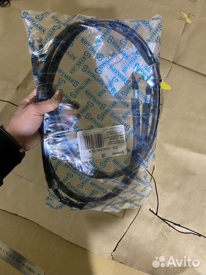 Трос ручного тормоза задний. Opel Astra