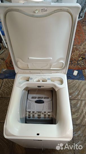 Стиральная машина с вертикальной загрузкой aeg