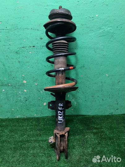 Стойка амортизатора передняя правая Renault Duste