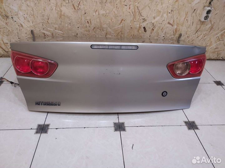 Лансер 10 крышка багажника