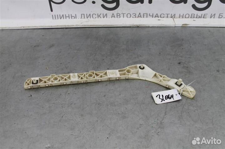 Кронштейн заднего бампера левый Nissan Almera G15