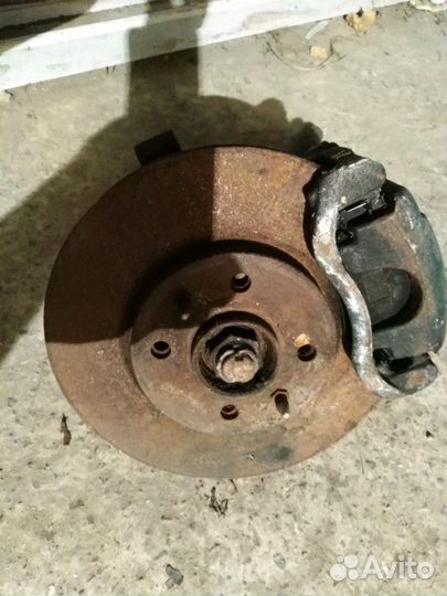 Кулак поворотный с супортом от Fiat albea