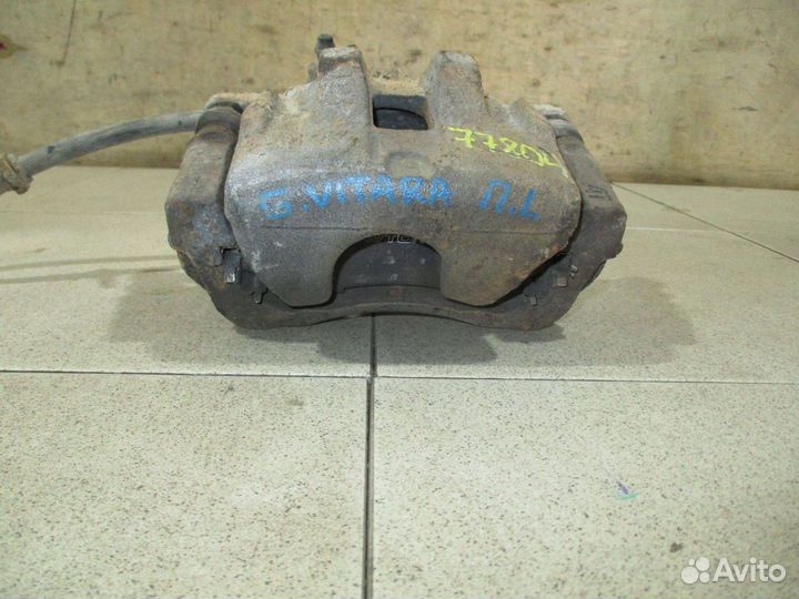 Суппорт передний левый Suzuki Grand Vitara 3