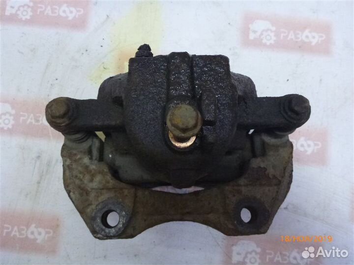 Суппорт передний левый Nissan Almera N16 QG15 2001