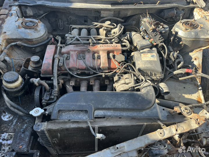 По запчастям Mazda 626 GE 2.0
