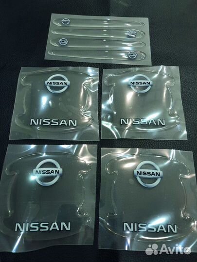 Защитные наклейки под ручки авто Nissan