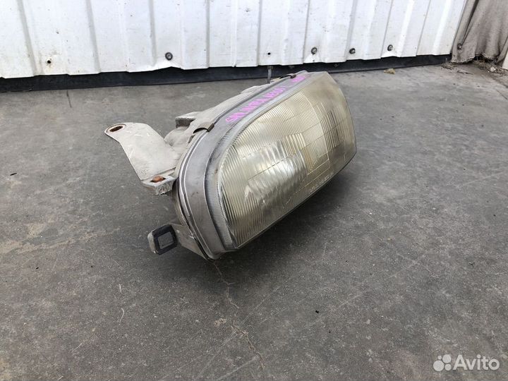 Фара левая Toyota Sprinter AE100