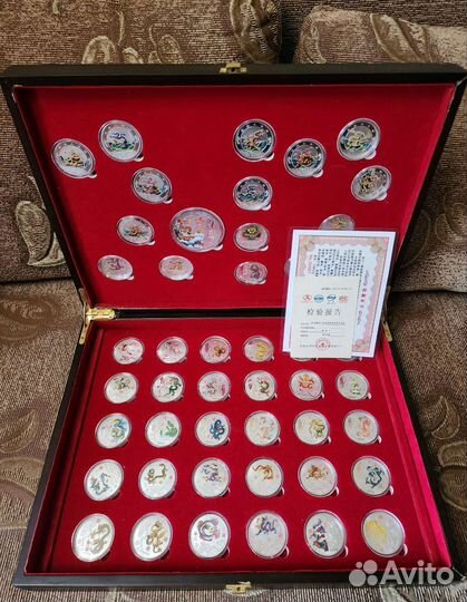 Монеты Китая 65 шт посеребренные