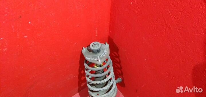 Калина стойка передняя левая пружина конус с деф