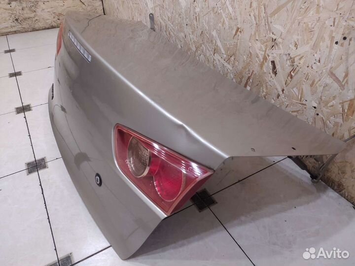 Лансер 10 крышка багажника