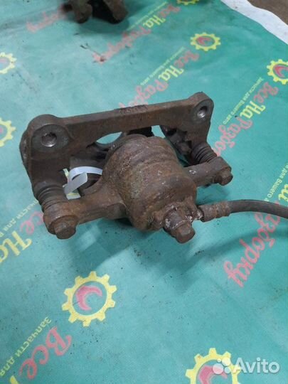 Суппорт задний левый Chevrolet Spark хечбэк