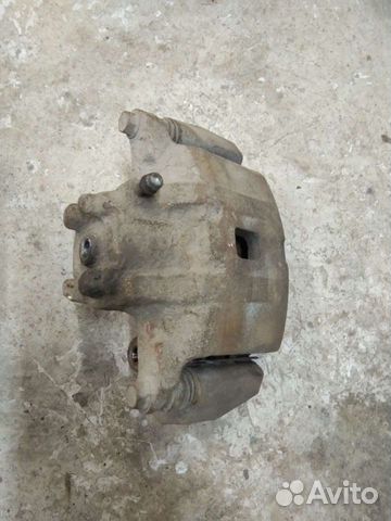 Суппорта передние Митсубиси Лансер 9